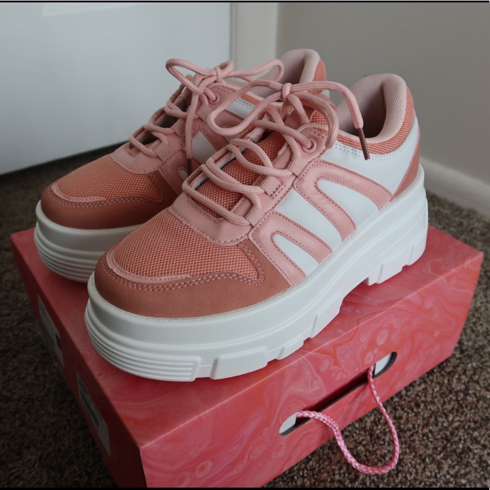 Pink and white platform sneakers